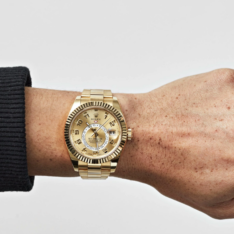 Sky-dweller gold champagne dial arabic numerals 42mm