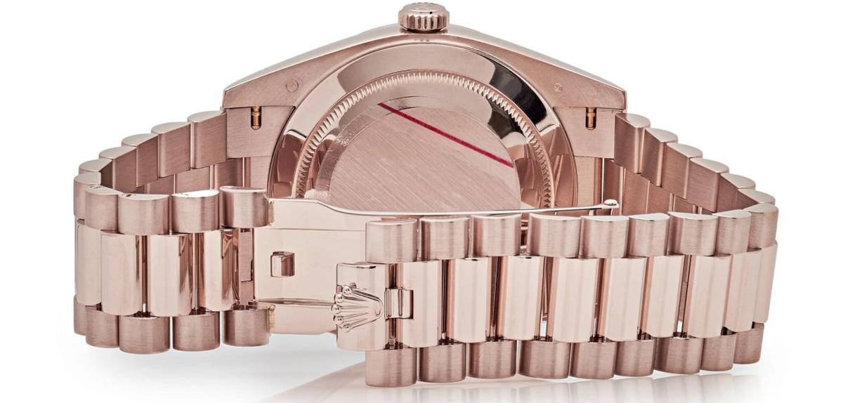 Day-date rose gold sundust roman dial 40mm