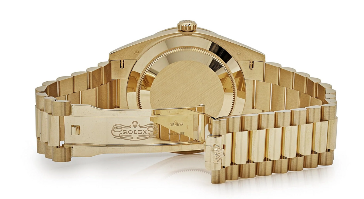 Day-date yellow gold baguette diamond dial 40mm